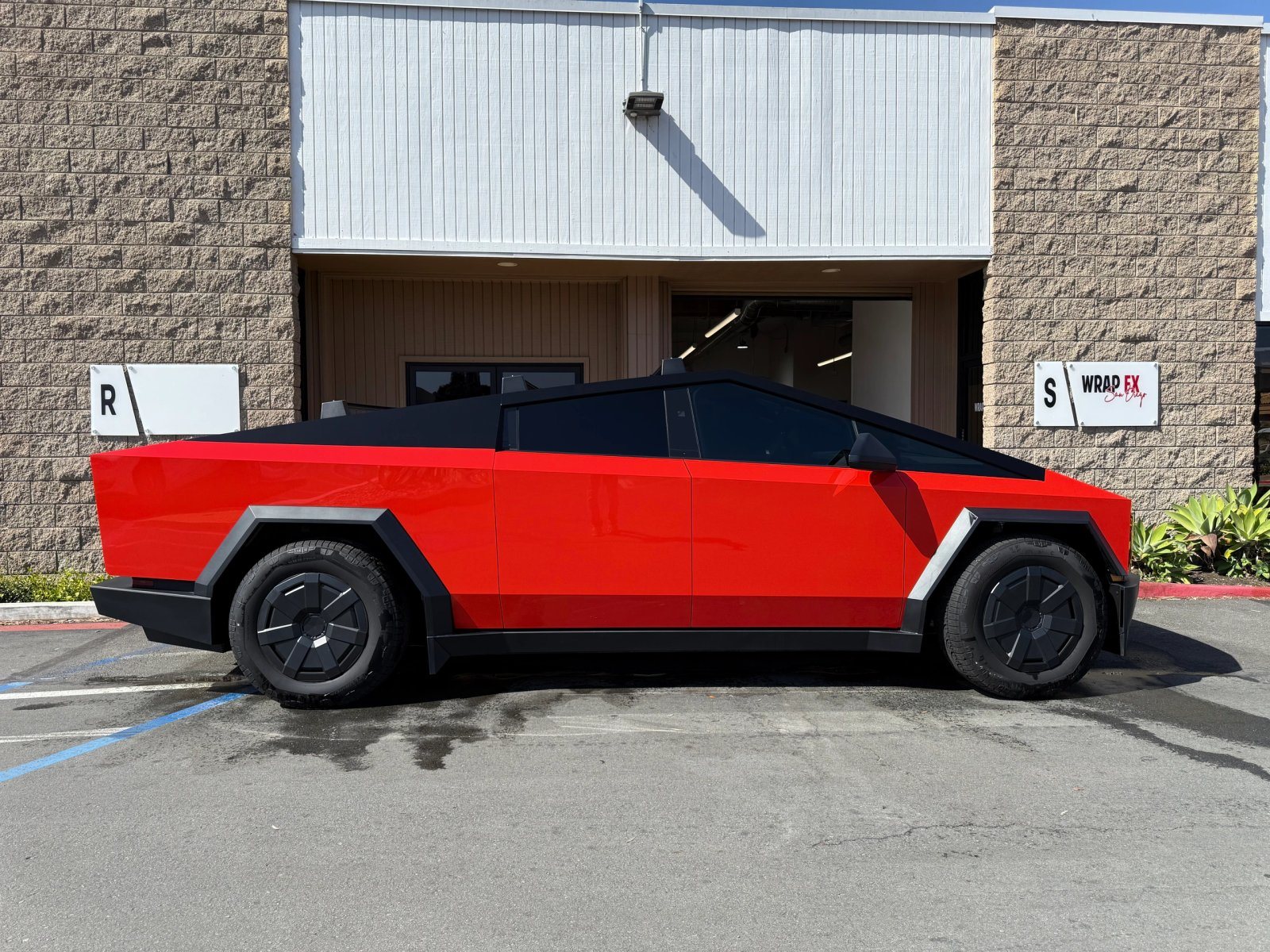 Tesla Cybertruck with a vivid red color-change wrap by WrapFX San Diego