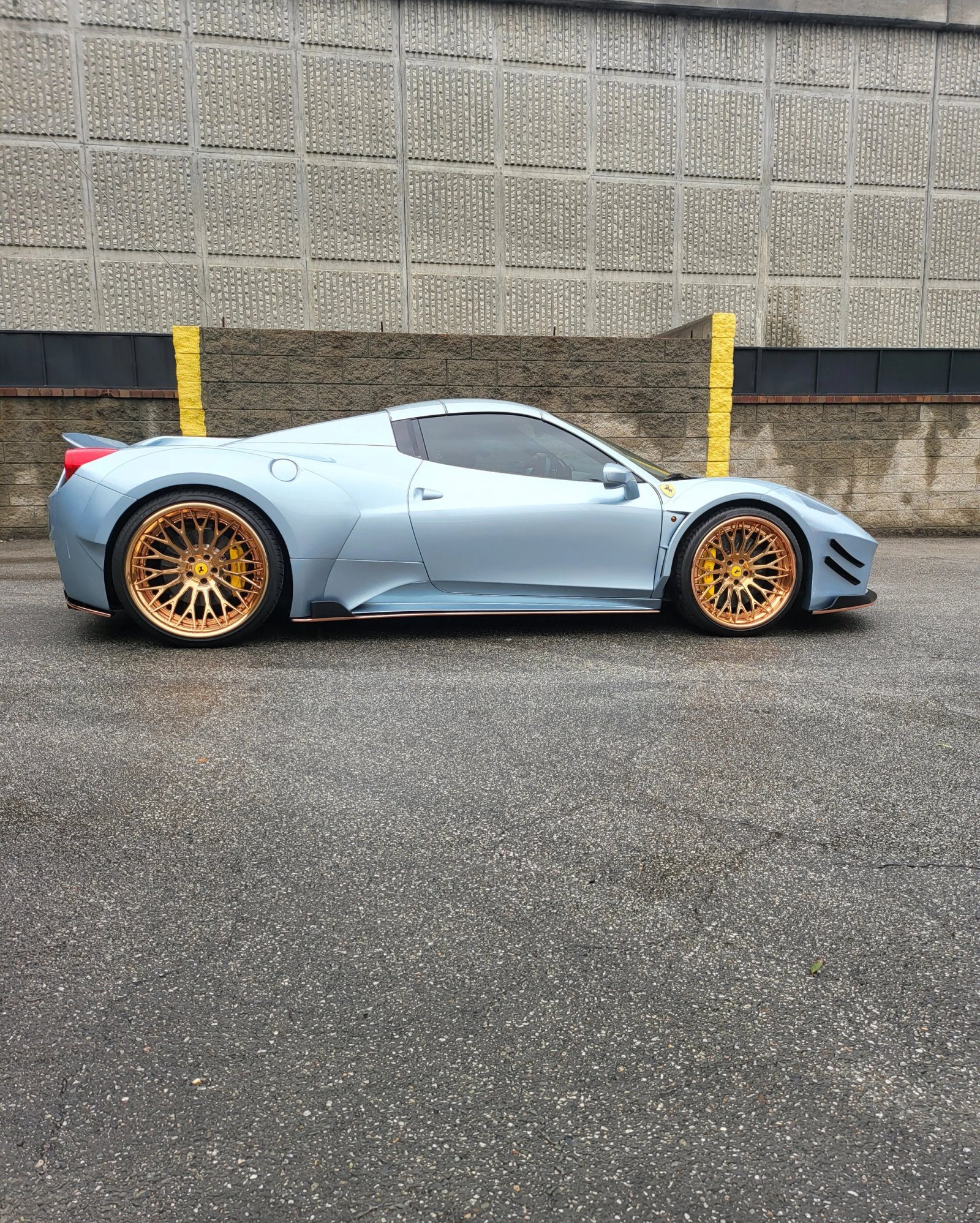 Ferrari 458 with an ice blue finish by WrapFX San Diego