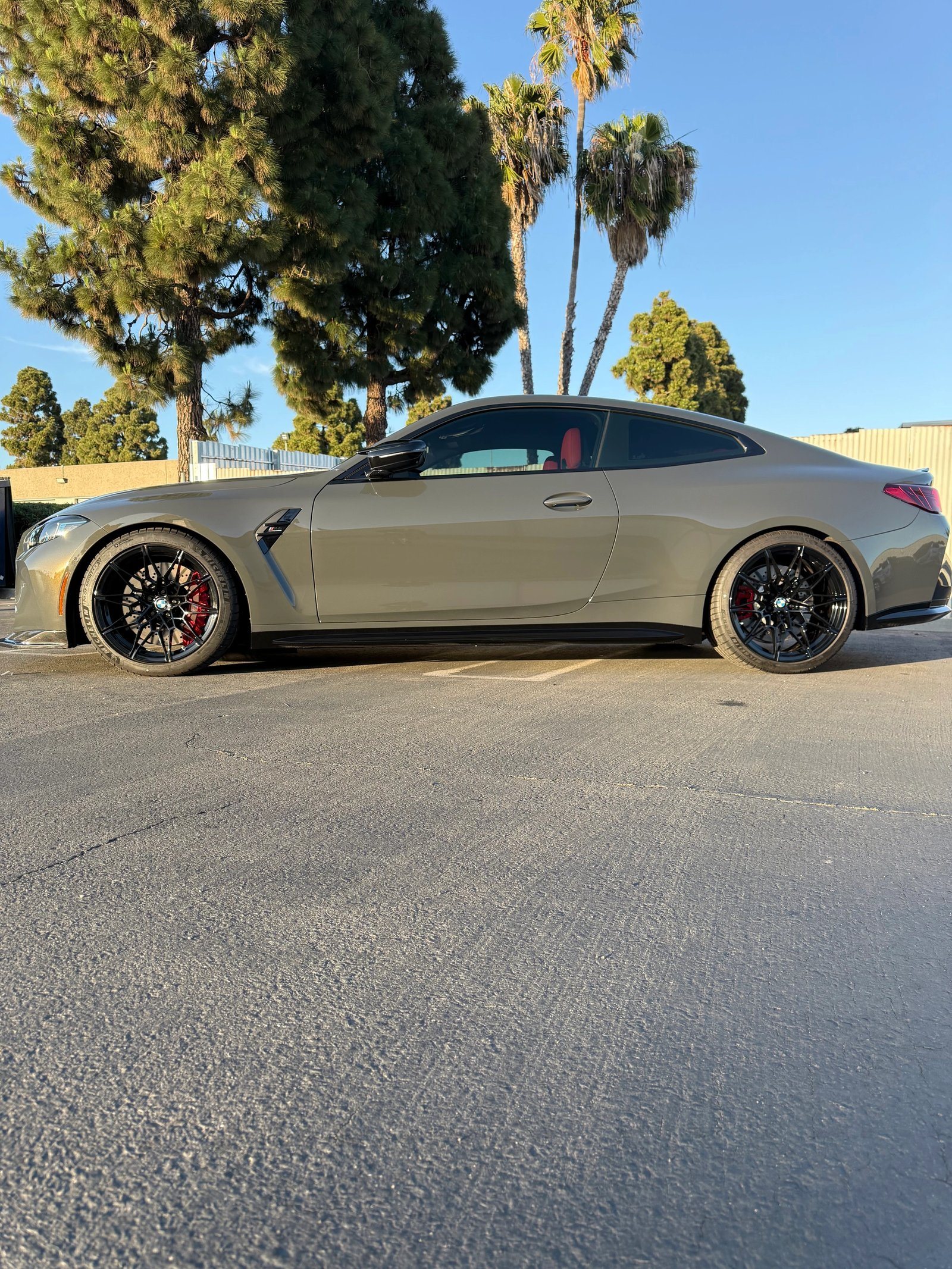 BMW M4 with a gloss grey color-change wrap by WrapFX San Diego